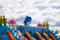 Boy sliding down an inflatable Side . Russia Berezniki 26 may 2019 Royalty Free Stock Photo