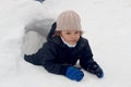 Boy in snow igloo