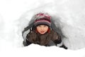 Boy in snow tunnel