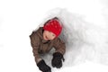 Boy in snow tunnel