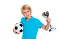 Boy with soccer ball and cup in front of white background Royalty Free Stock Photo