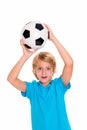 Boy with soccer ball in front of white background Royalty Free Stock Photo