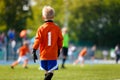 Boy Soccer Goalkeeper on the Field. Young Football Goalie on Kids Sports Competition