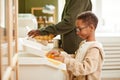 Boy Sorting Waste for Recycling Royalty Free Stock Photo