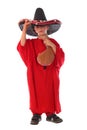 Boy in spanish red shirt and sombrero holding bota bag with wine