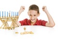 Boy Spinning the Chanukah Dreidel