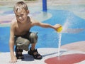 Boy at splash zone Royalty Free Stock Photo