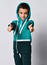 Boy in sportswear gesturing thumbs-up portrait