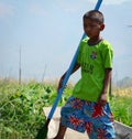 A boy standing on boat in Inle, Myanmar