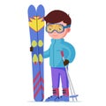 Boy standing with mountain skis and sticks