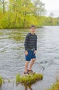 Boy Standing on Rock in the Wisconsin River - Merrill, WI Royalty Free Stock Photo