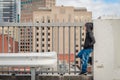 Boy standing on top of the roof Royalty Free Stock Photo