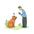 Boy stares into a gadget on a walk with a dog. Dog puzzled by the owner with a phone. Gadget addiction, social media Royalty Free Stock Photo