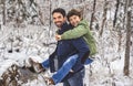 boy and Stepfather on forest in winter season Royalty Free Stock Photo