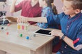 Boy studying with tablet and lab equipment Royalty Free Stock Photo