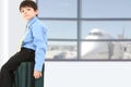 Boy in Suit at Airport Royalty Free Stock Photo