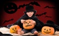 Boy in suit of count Dracula on halloween