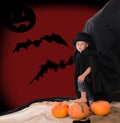 Boy in suit of count Dracula on halloween