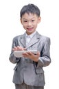 Boy in suit using tablet computer