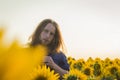 Boy at sunflowers field