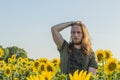 Boy at sunflowers field