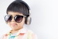 Boy with Sunglasses is listen to music headphone isolated Royalty Free Stock Photo