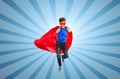 Boy in super hero cape and mask showing thumbs up Royalty Free Stock Photo