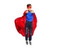 Boy in super hero cape and mask showing thumbs up Royalty Free Stock Photo