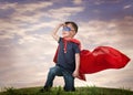 A boy in a Superman costume