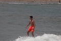 The boy surfer in Lagos popular beach, Tarkwa bay, Lagos Nigeria Royalty Free Stock Photo