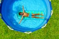 Boy swim on inflatable matrass view from above Royalty Free Stock Photo