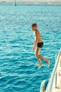 Boy swiming at red sea Royalty Free Stock Photo