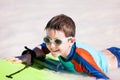 Boy swimming on boogie board Royalty Free Stock Photo