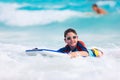 Boy swimming on boogie board Royalty Free Stock Photo