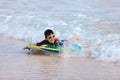 Boy swimming on boogie board Royalty Free Stock Photo