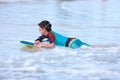 Boy swimming on boogie board Royalty Free Stock Photo