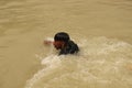 Boy is swimming in the Ganga  river in India. Royalty Free Stock Photo