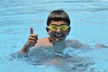 Boy in swimming in the pool