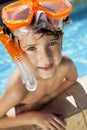 Boy In A Swimming Pool with Goggles and Snorkel Royalty Free Stock Photo