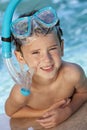 Boy In A Swimming Pool with Goggles and Snorkel Royalty Free Stock Photo