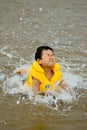 Boy swimming in sea