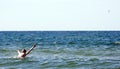 Boy swimming in sea