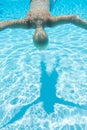 Boy swims face down