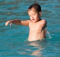 Boy swims in the water park Royalty Free Stock Photo