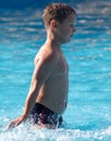 Boy swims in the water park Royalty Free Stock Photo