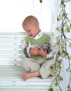 Boy on Swing with Bunny Royalty Free Stock Photo