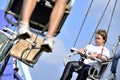 Boy on Swing Ride Royalty Free Stock Photo