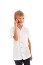 A boy talking on a cell phone Royalty Free Stock Photo