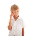 A boy talking on a cell phone Royalty Free Stock Photo