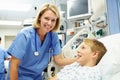 Boy Talking To Female Nurse In Emergency Room Royalty Free Stock Photo